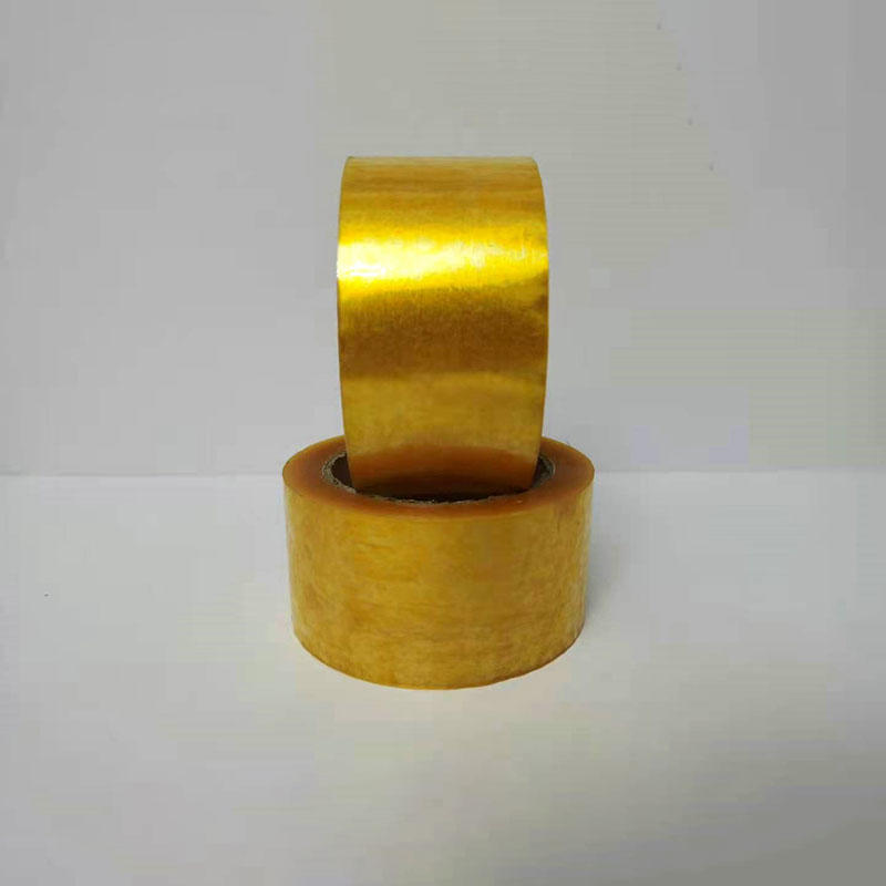  الشريط الكرتوني الشفاف ذو اللون البني الذهبي ذو الالتصاق العالي، يستخدم لتعبئة صندوق النقل